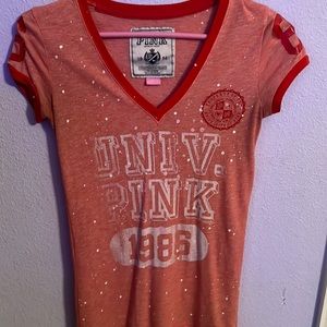 Pink Short sleeve tshirt "1986" says xs but fits more like a regular small.